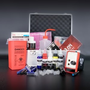 Box of disposable tattoo gloves in black and white packaging